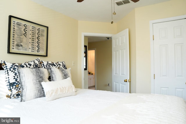 bedroom with visible vents and a ceiling fan