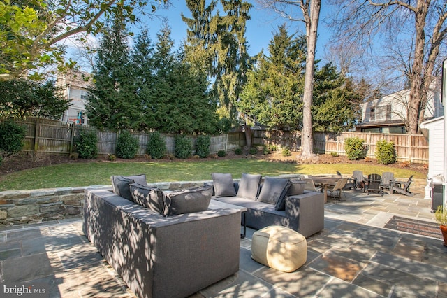 view of patio / terrace featuring outdoor lounge area and a fenced backyard