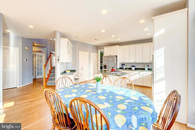 dining room featuring light hardwood / wood-style floors