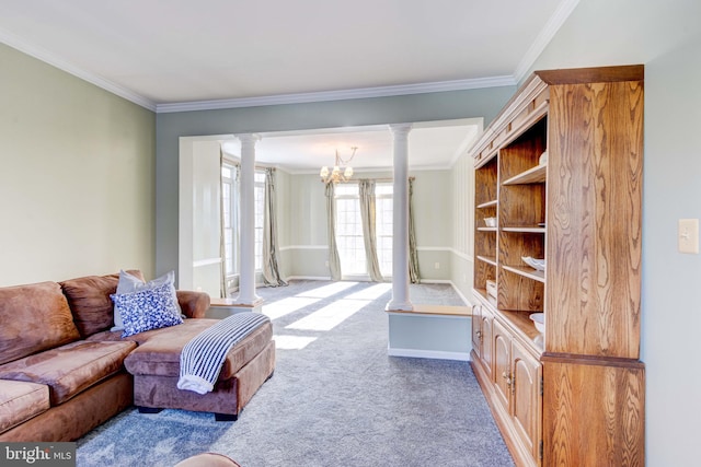 carpeted living room with a notable chandelier, ornamental molding, and decorative columns