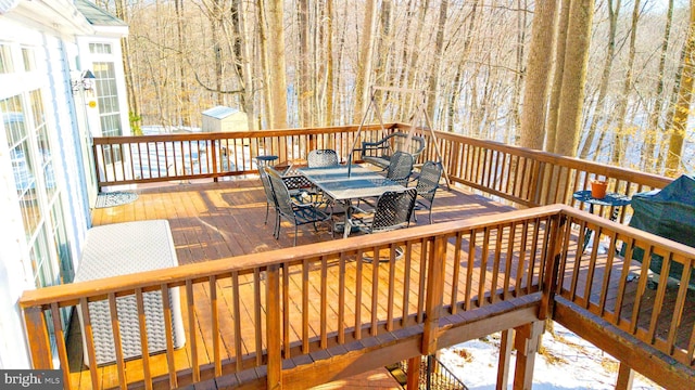 view of snow covered deck