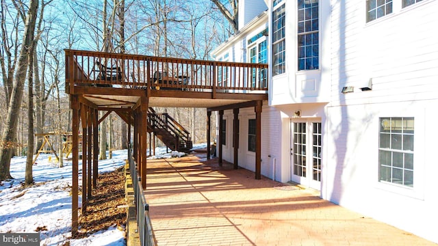 view of snow covered deck