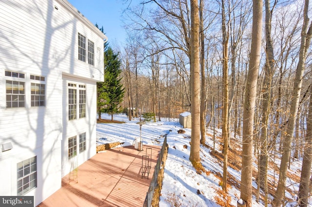 view of snow covered deck