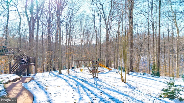 view of yard covered in snow