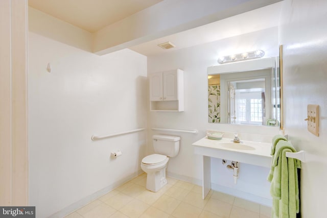 bathroom featuring sink and toilet