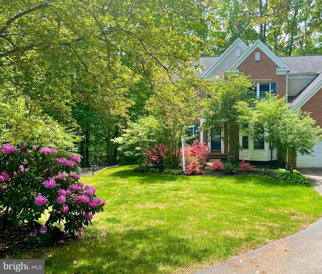 view of yard featuring a garage