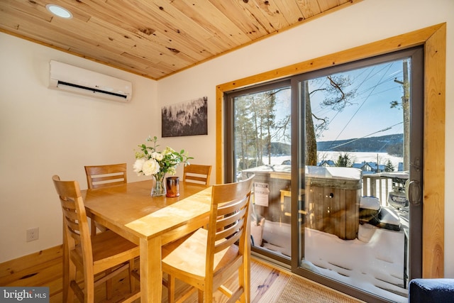 dining space featuring a mountain view, hardwood / wood-style flooring, a wall unit AC, wooden ceiling, and crown molding