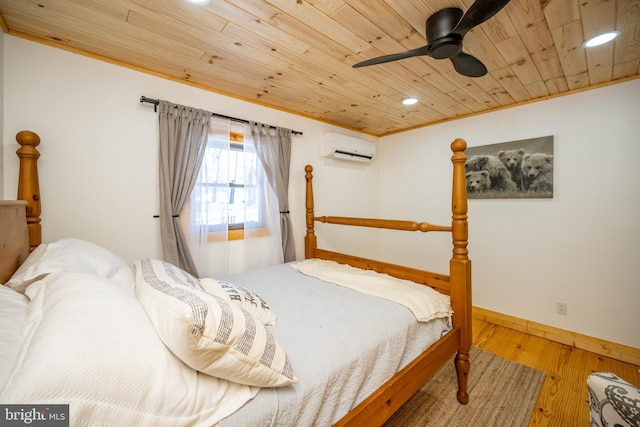 bedroom with an AC wall unit, ceiling fan, hardwood / wood-style flooring, wood ceiling, and ornamental molding