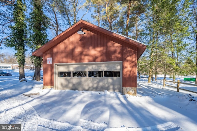 view of snow covered garage