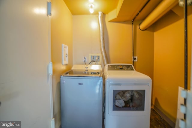 laundry area featuring independent washer and dryer