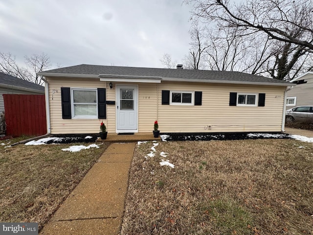 view of front of property with a front lawn