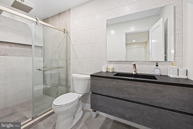 bathroom with backsplash, tile walls, an enclosed shower, and toilet