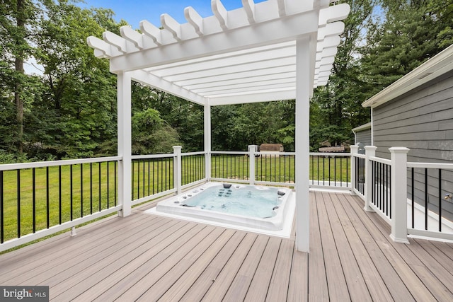 wooden deck featuring a pergola and a yard