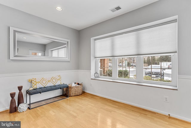 sitting room with light hardwood / wood-style floors