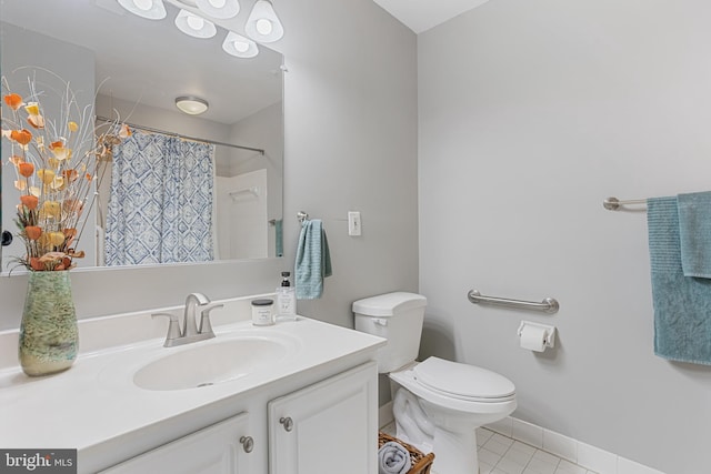 bathroom featuring tile patterned floors, toilet, vanity, and a shower with shower curtain