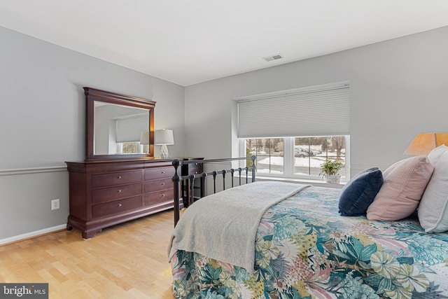 bedroom with light hardwood / wood-style flooring