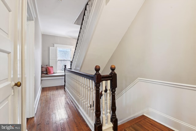 hall with dark hardwood / wood-style floors