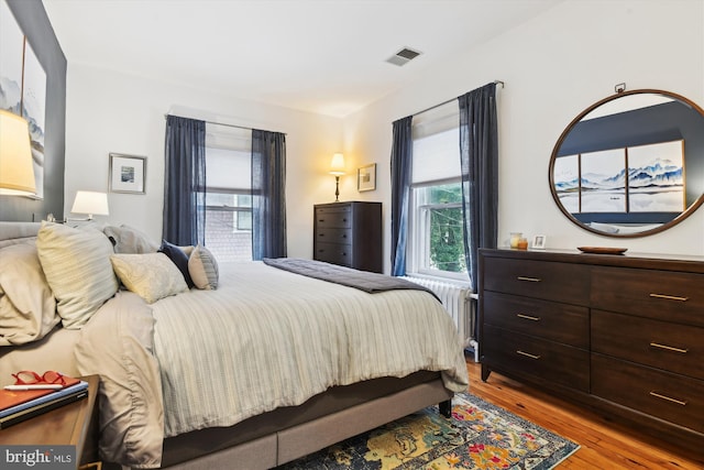 bedroom featuring light wood-type flooring