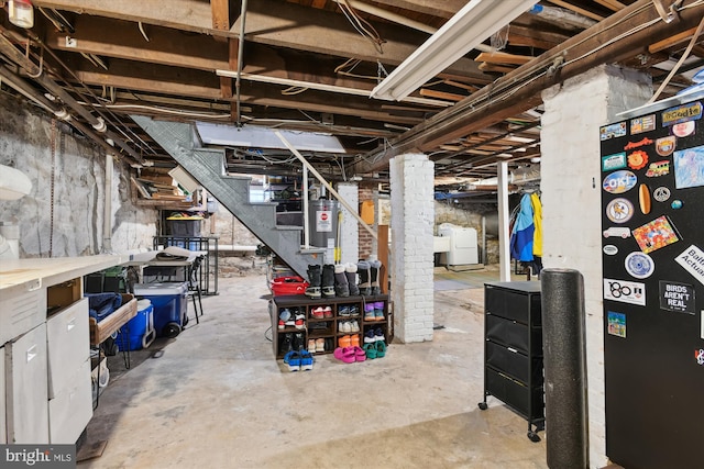 basement with washer / dryer and gas water heater