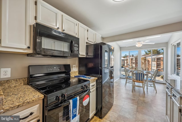 kitchen with black appliances, white cabinetry, ceiling fan, and light stone counters