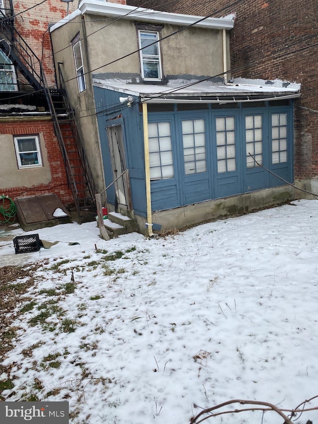 view of snow covered property