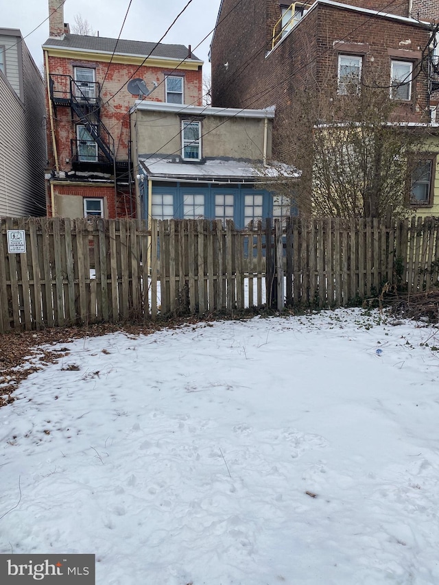 view of snow covered property