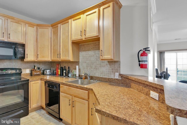 kitchen featuring kitchen peninsula, light brown cabinets, backsplash, black appliances, and sink