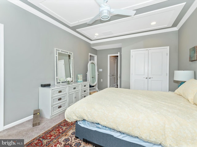 bedroom featuring a closet, ceiling fan, and carpet