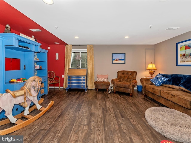 living room featuring dark hardwood / wood-style floors