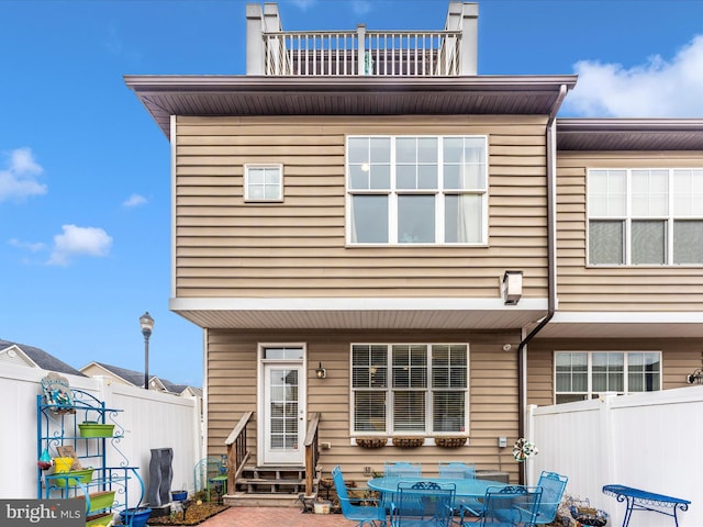 back of house featuring a patio