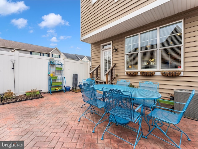 view of patio / terrace with central AC