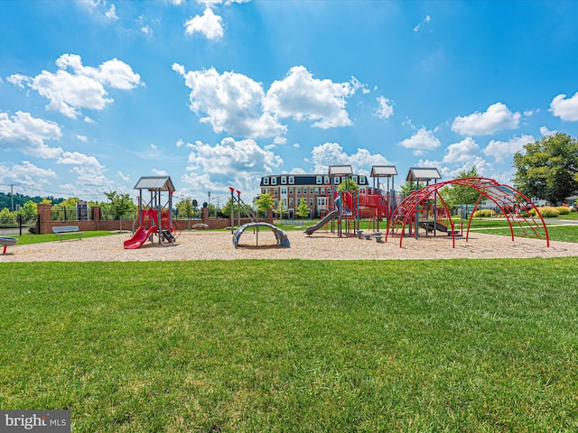 view of playground featuring a lawn