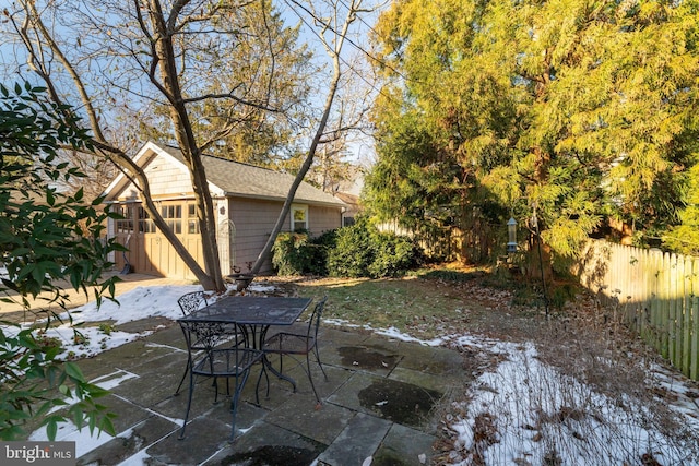 view of patio / terrace with an outbuilding