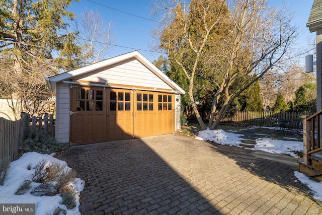 view of snow covered garage