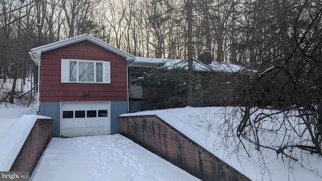 exterior space with a garage