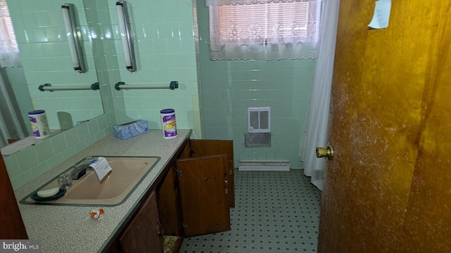 bathroom with decorative backsplash and vanity