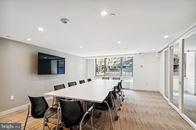dining space with recessed lighting and baseboards