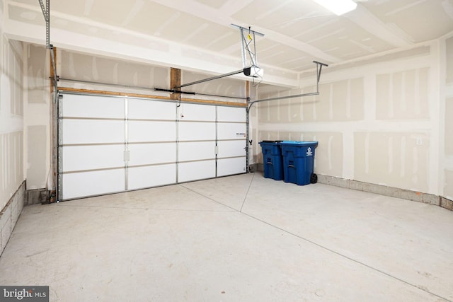 garage featuring a garage door opener