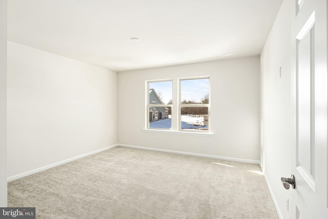 view of carpeted spare room