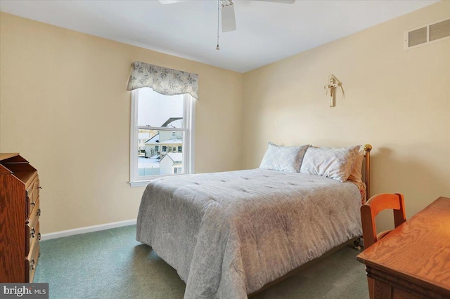 bedroom with dark carpet and ceiling fan