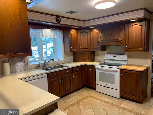 kitchen featuring sink, dishwasher, white range with electric stovetop, and crown molding