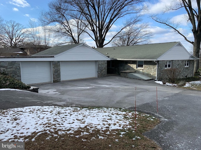 view of snow covered garage