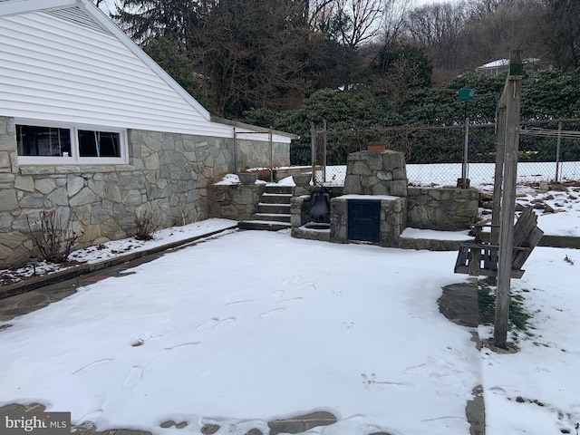 view of yard covered in snow