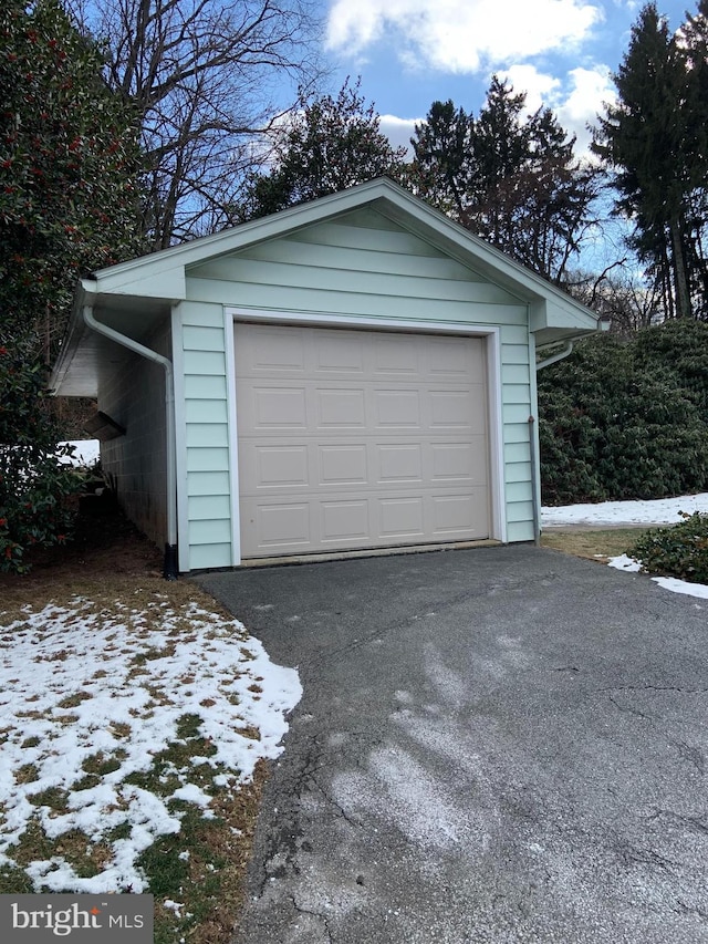 view of snow covered garage