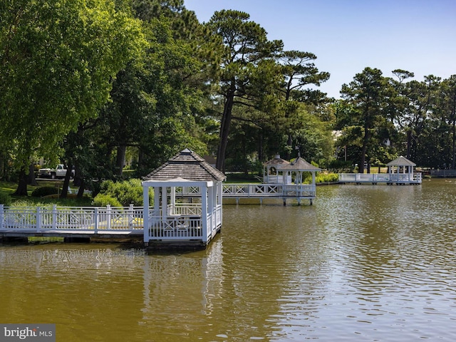 dock area featuring a water view and a gazebo