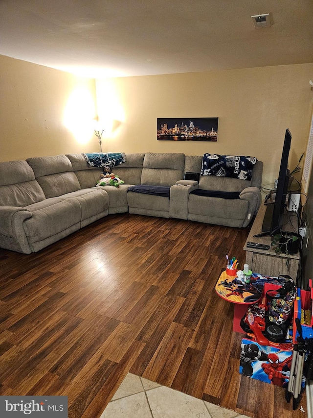 living room featuring dark hardwood / wood-style flooring