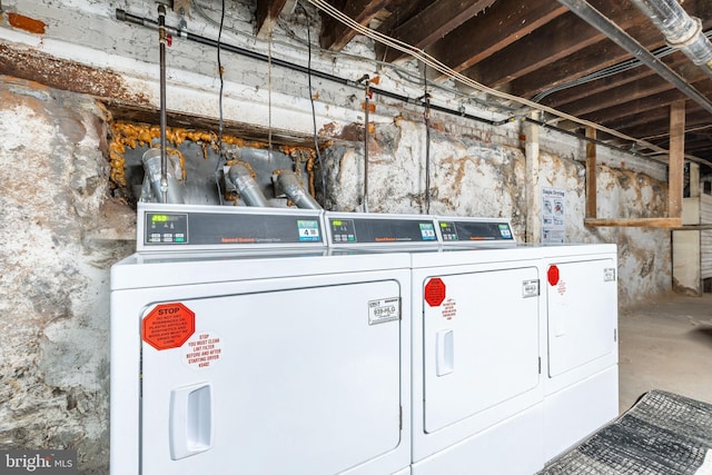 laundry room featuring washer and clothes dryer