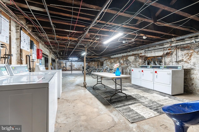 basement with separate washer and dryer