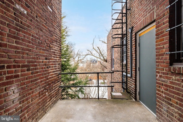 view of patio / terrace with a balcony