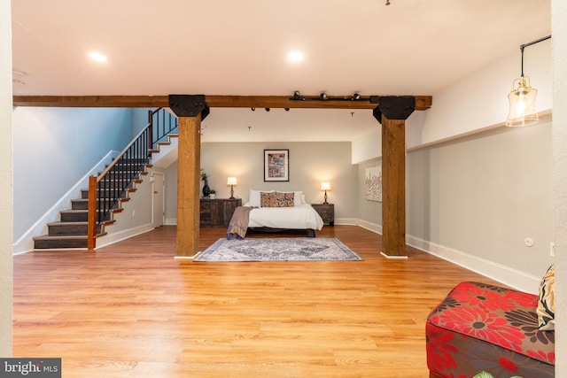 bedroom featuring wood-type flooring